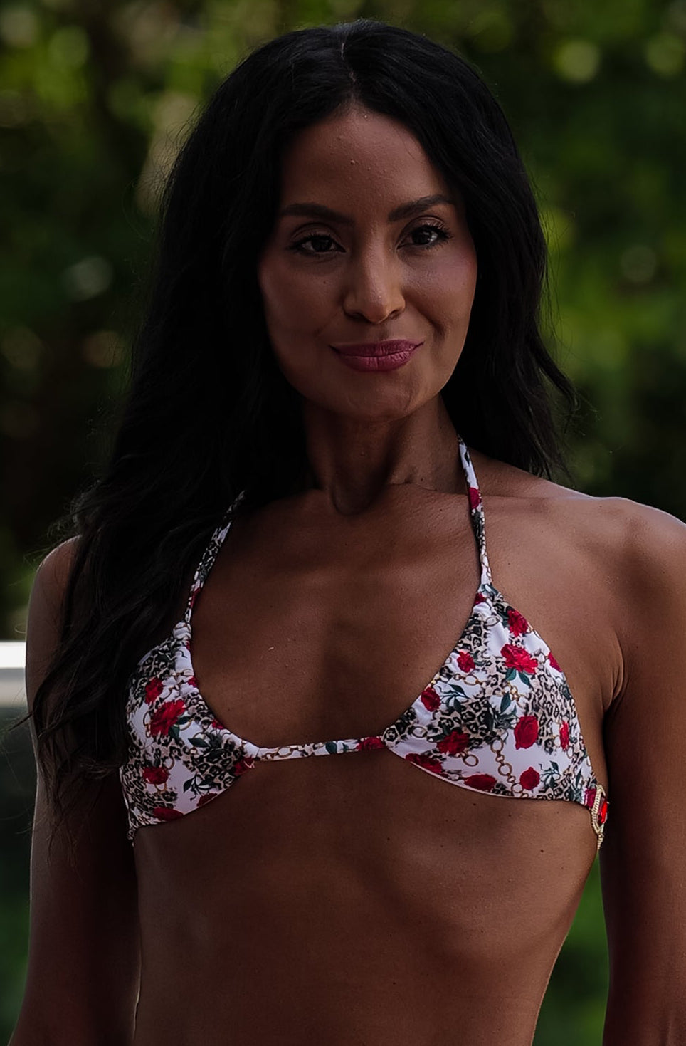 woman in rose floral bikini in jungle 